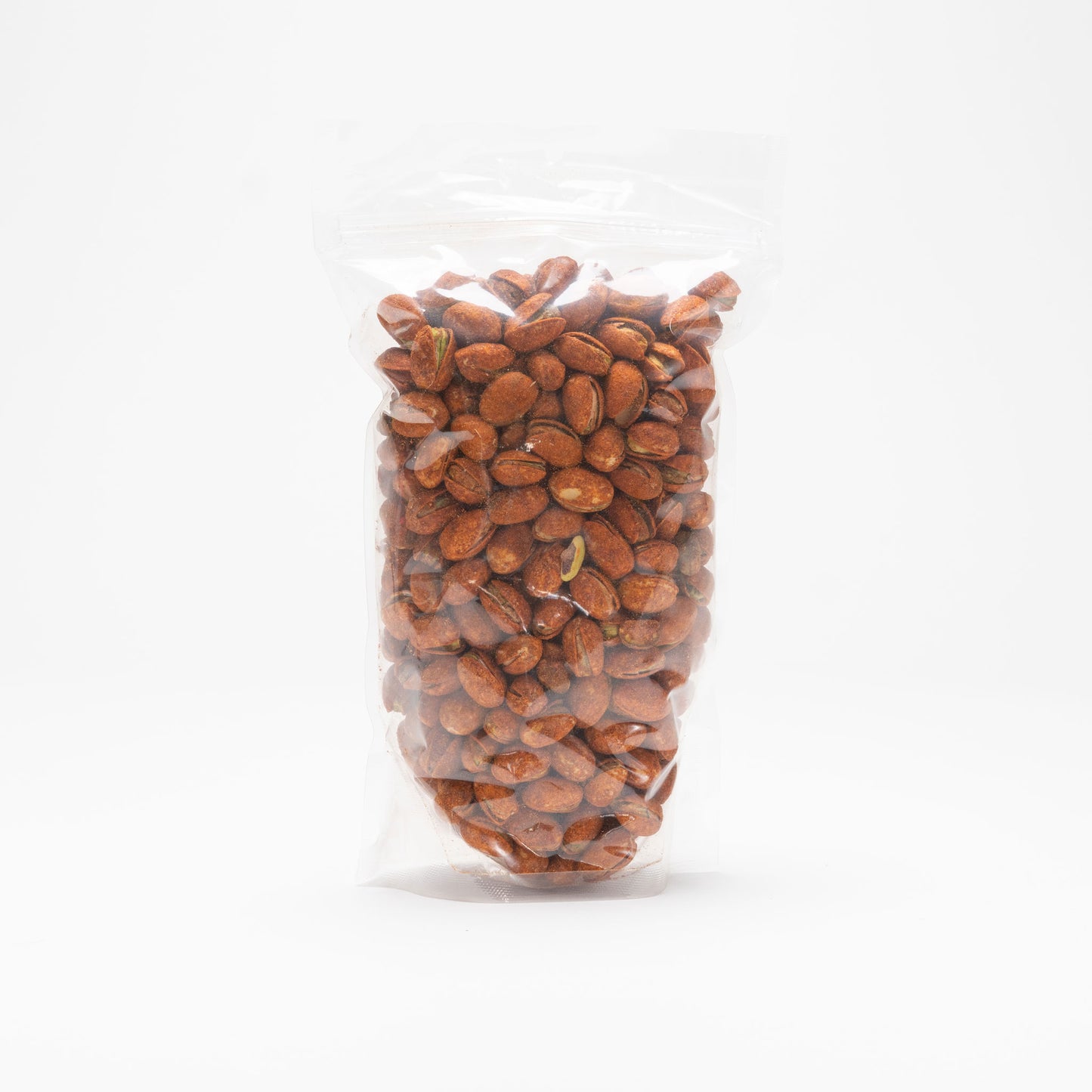 Back view of a clear bag of chili lemon pistachios