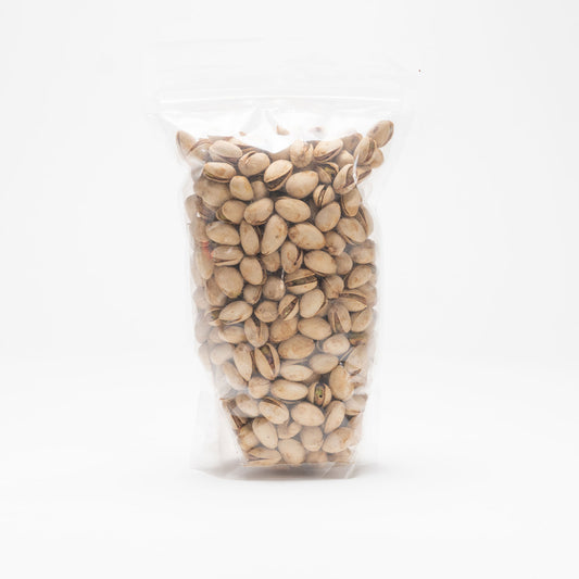 Back view of a clear bag of salt and pepper pistachios