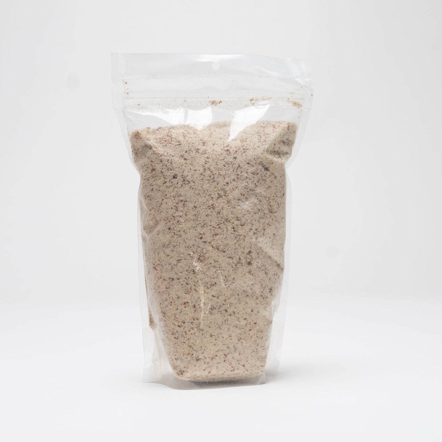 Back view of a clear bag of raw almond flour