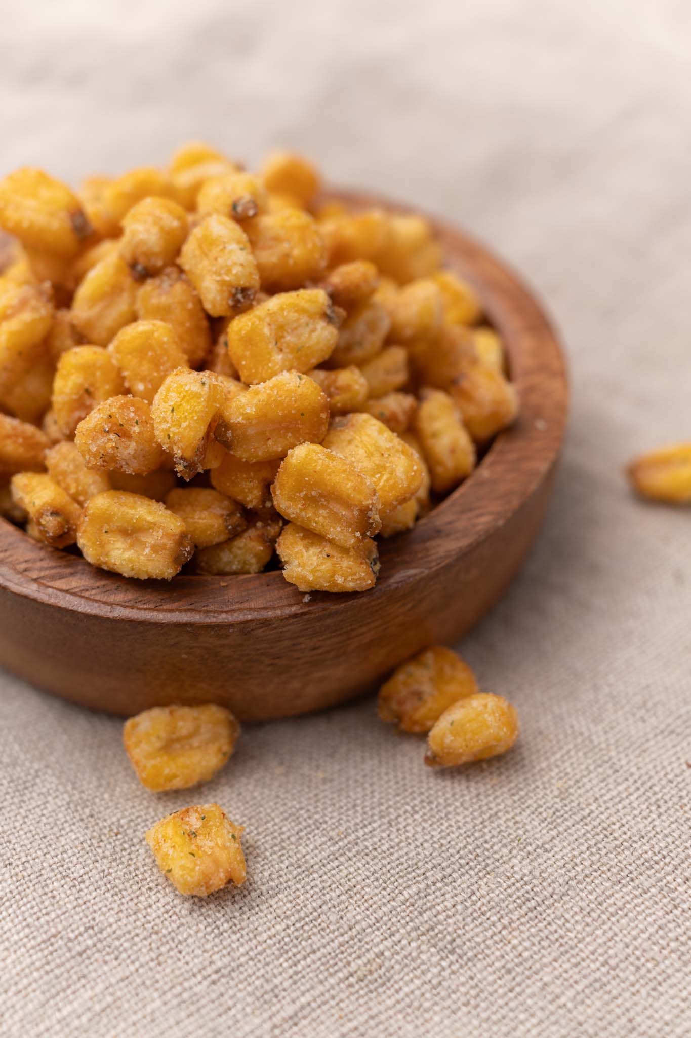 Wooden bowl filled with ranch corn nuggets
