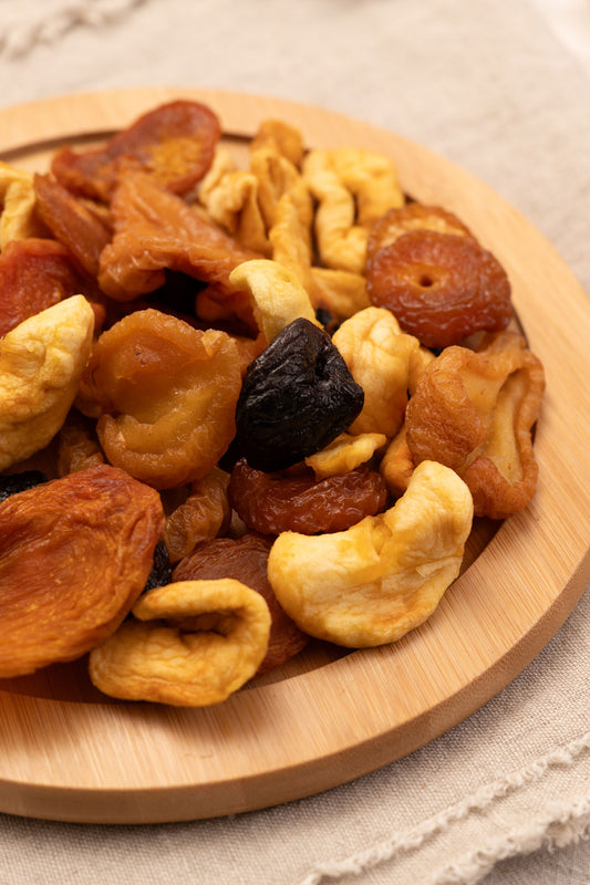 Dried mixed fruit on wooden platter