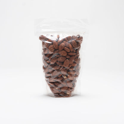 Back view of a clear bag of chili lemon almonds