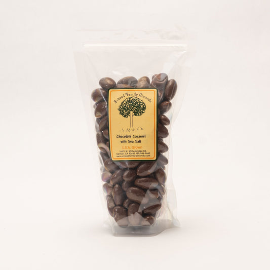 Clear bag filled with chocolate caramel sea salt covered almonds