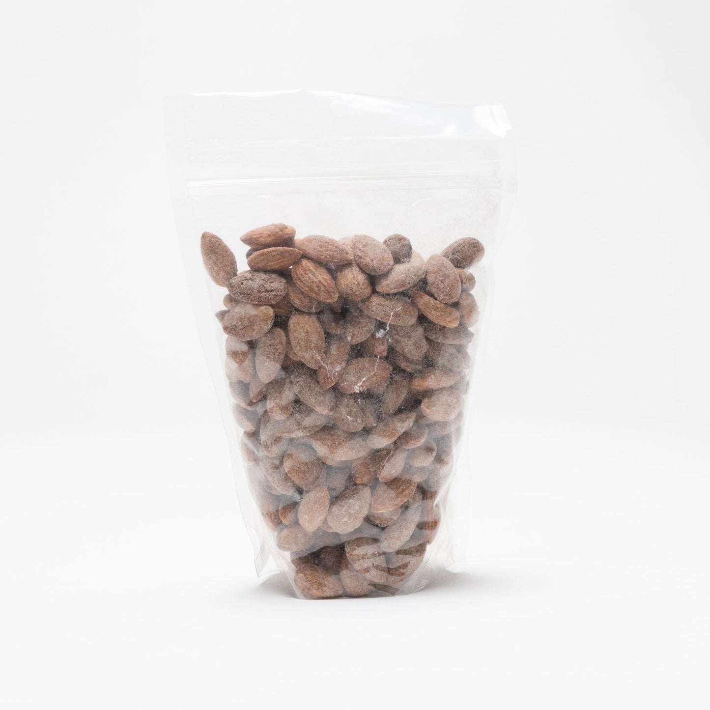 Back view of a clear bag of hickory almonds