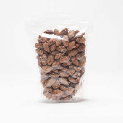 Back view of a clear bag of honey roasted almonds