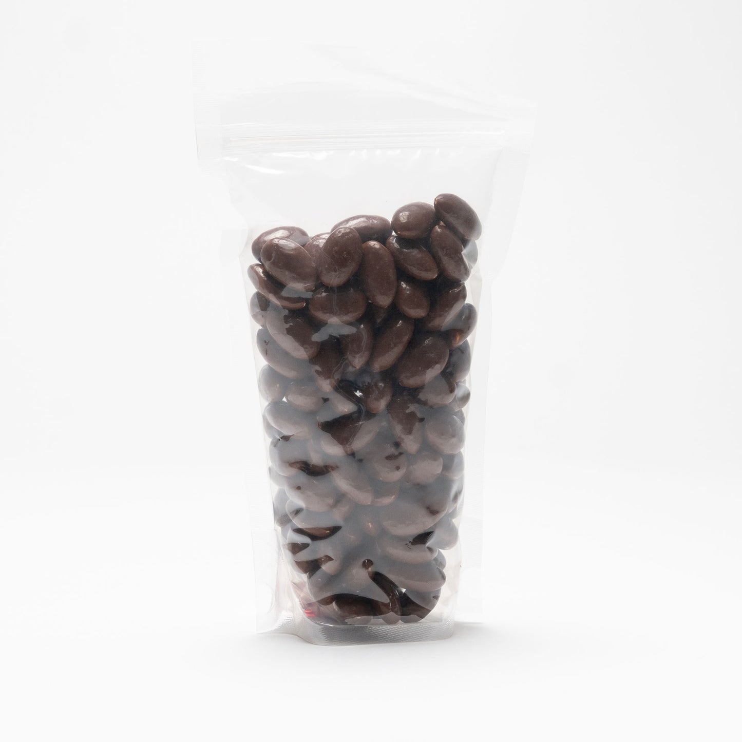 Back view of a clear bag milk chocolate covered almonds