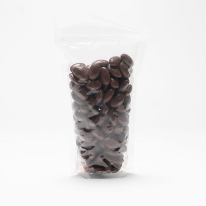 Back view of a clear bag milk chocolate covered almonds