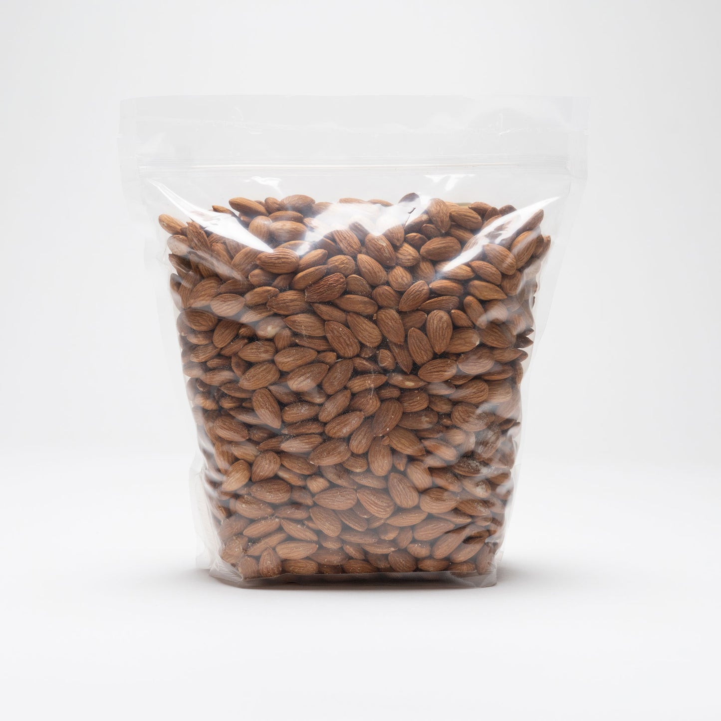 Back view of a clear bag of raw almonds