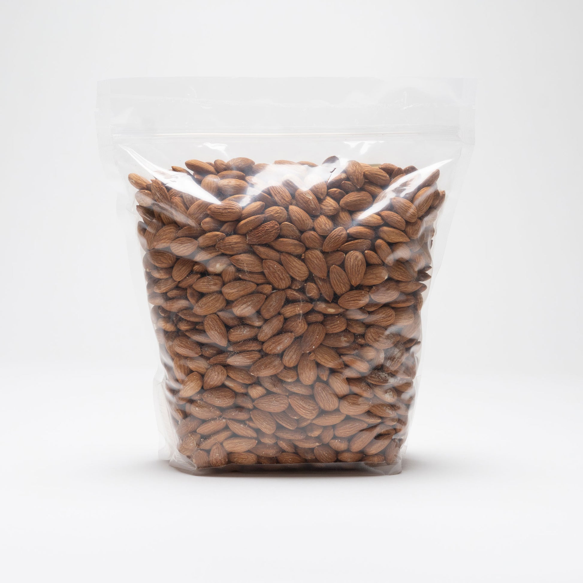 Back view of a clear bag of raw almonds