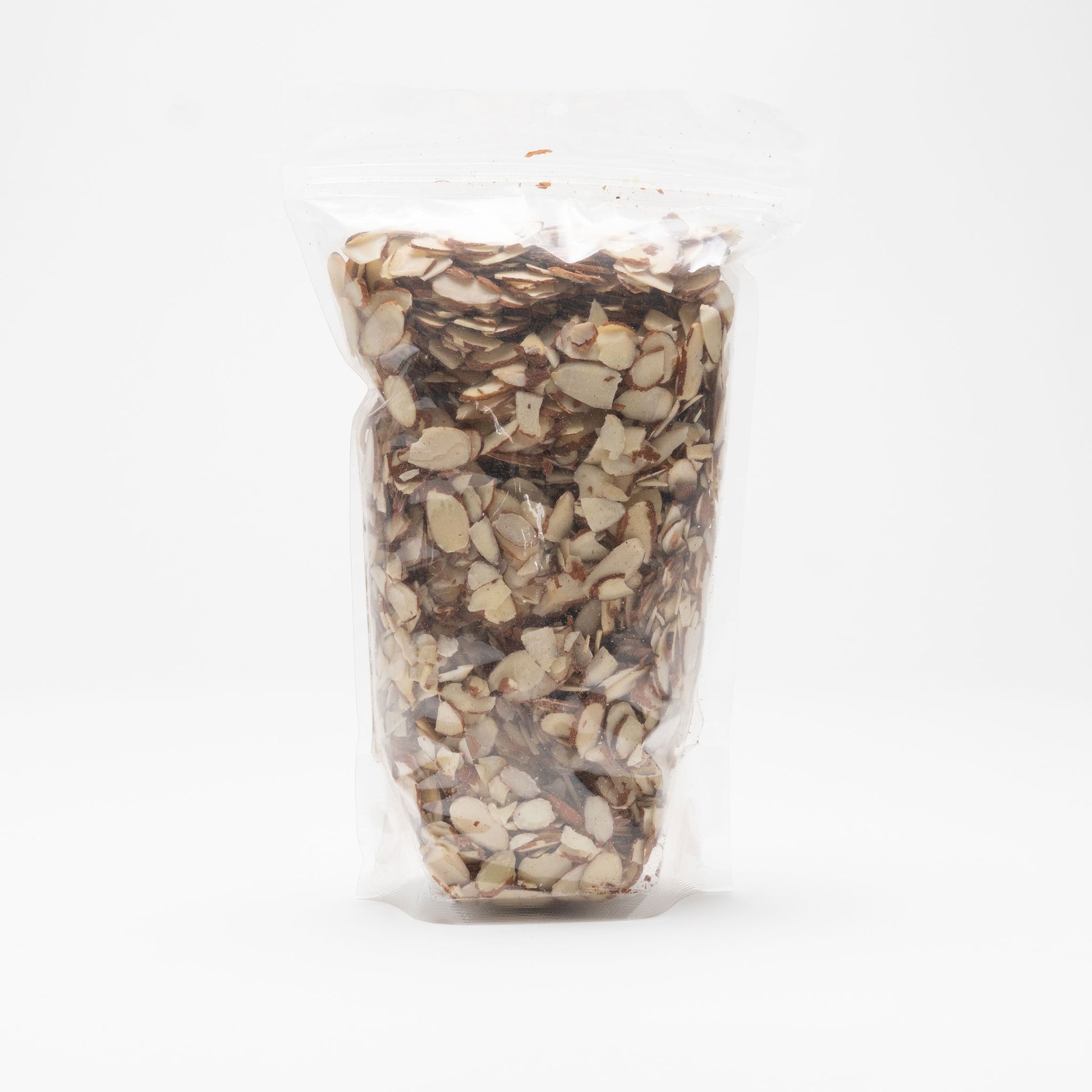Back view of a clear bag of raw sliced almonds