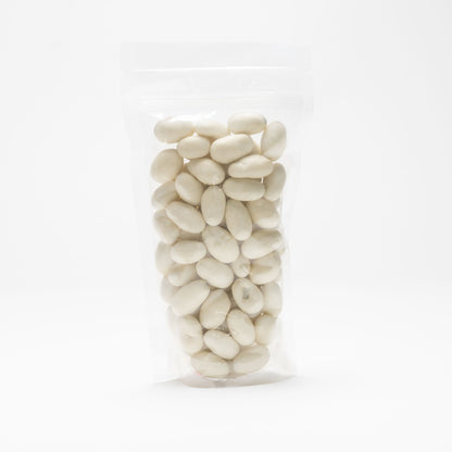 Back view of a clear bag of yogurt covered almonds