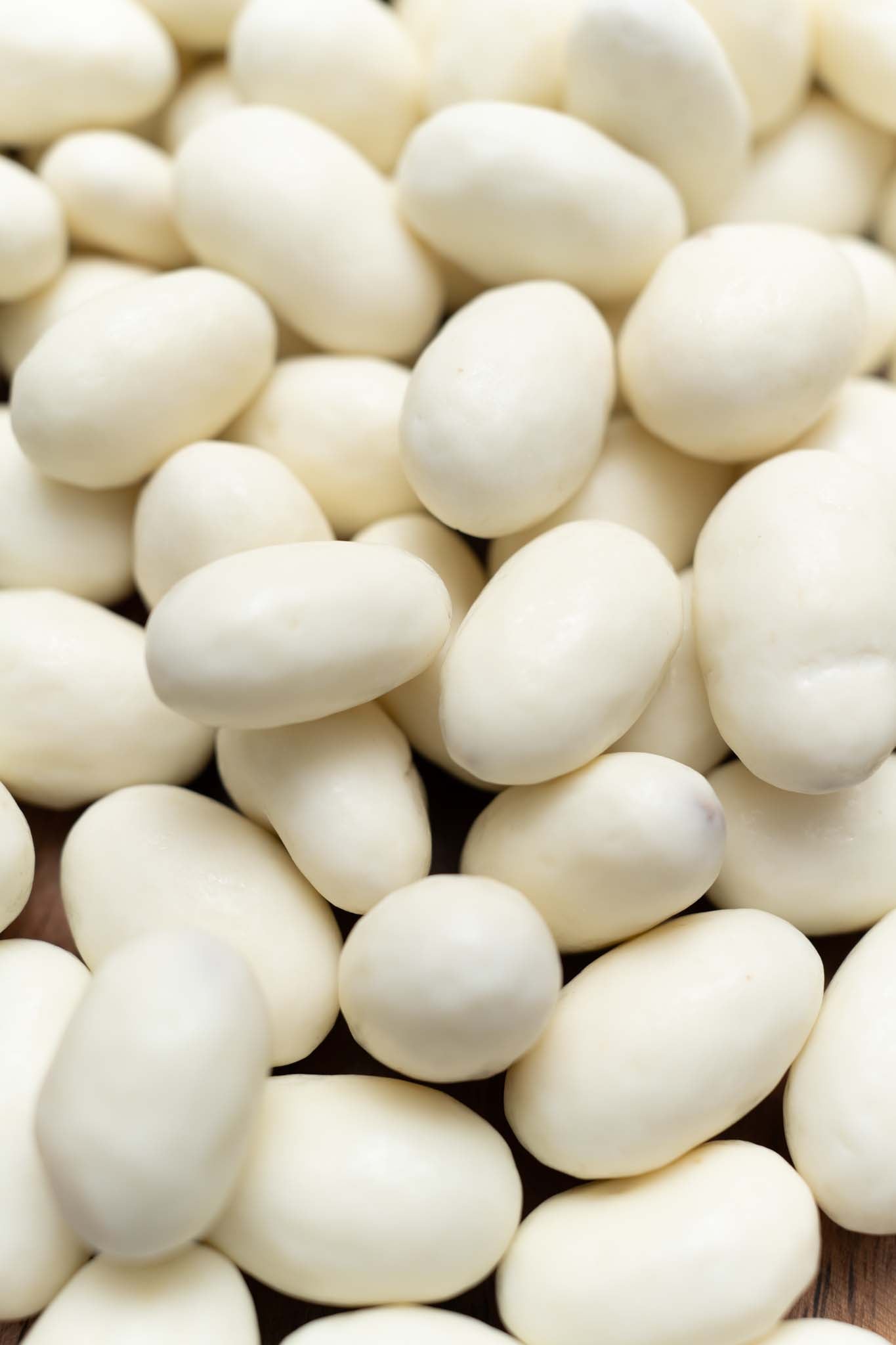Close up of yogurt covered almonds