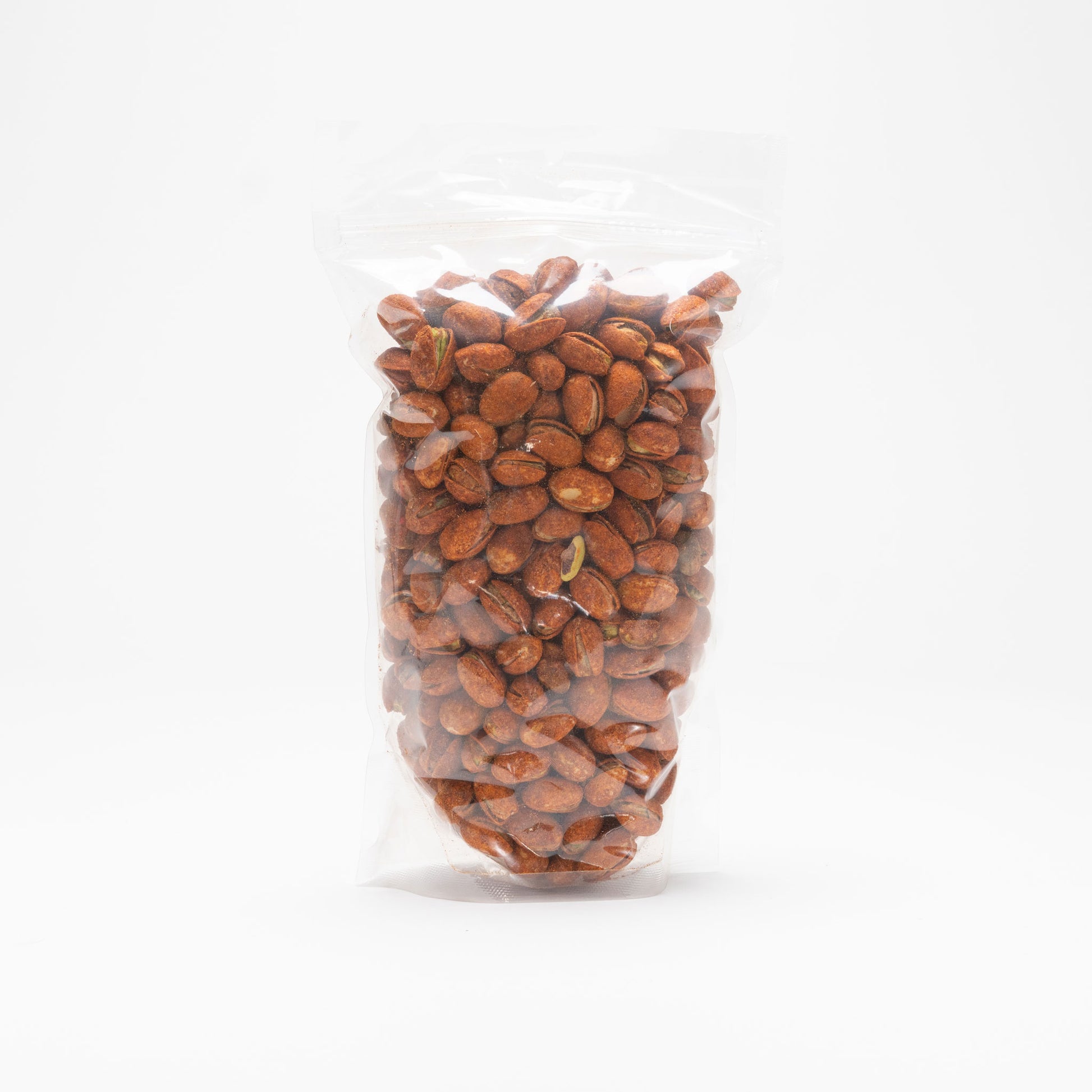Back view of a clear bag of chili lemon pistachios