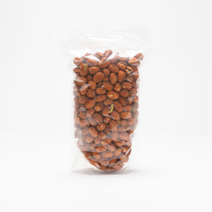 Back view of a clear bag of chili lemon pistachios