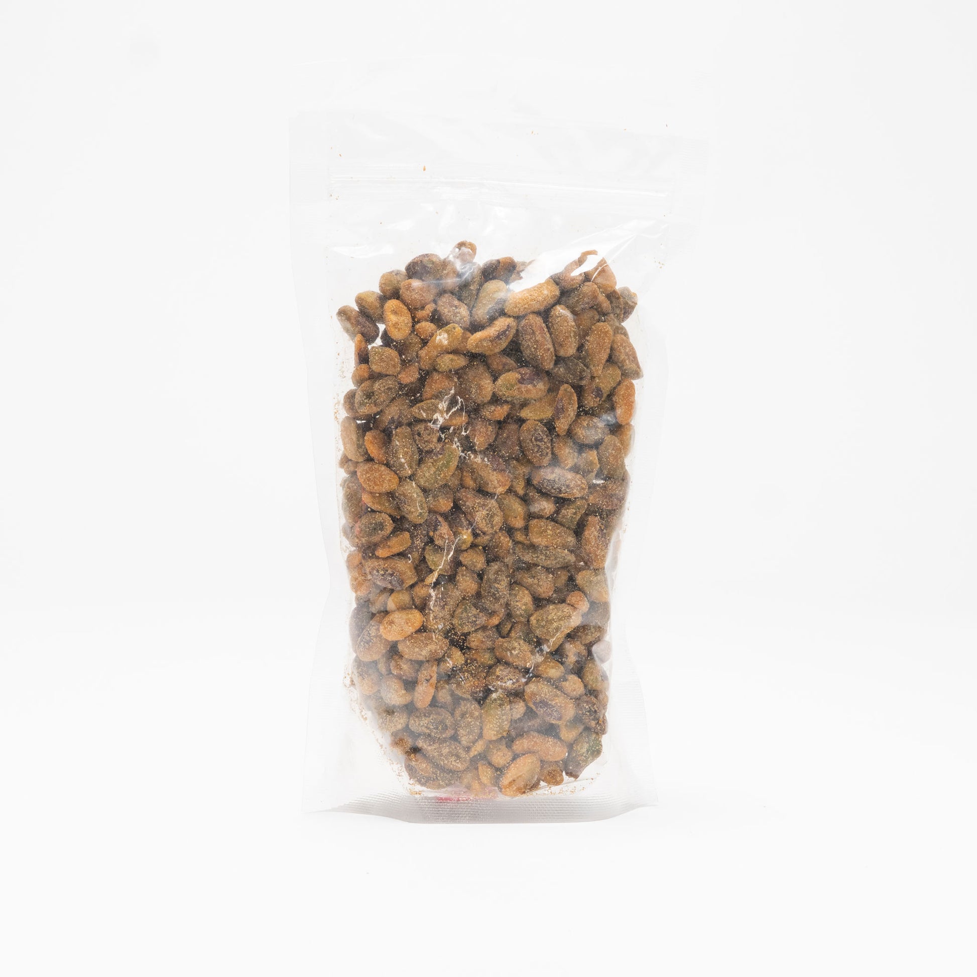 Back view of a clear bag of unshelled chili roasted pistachios