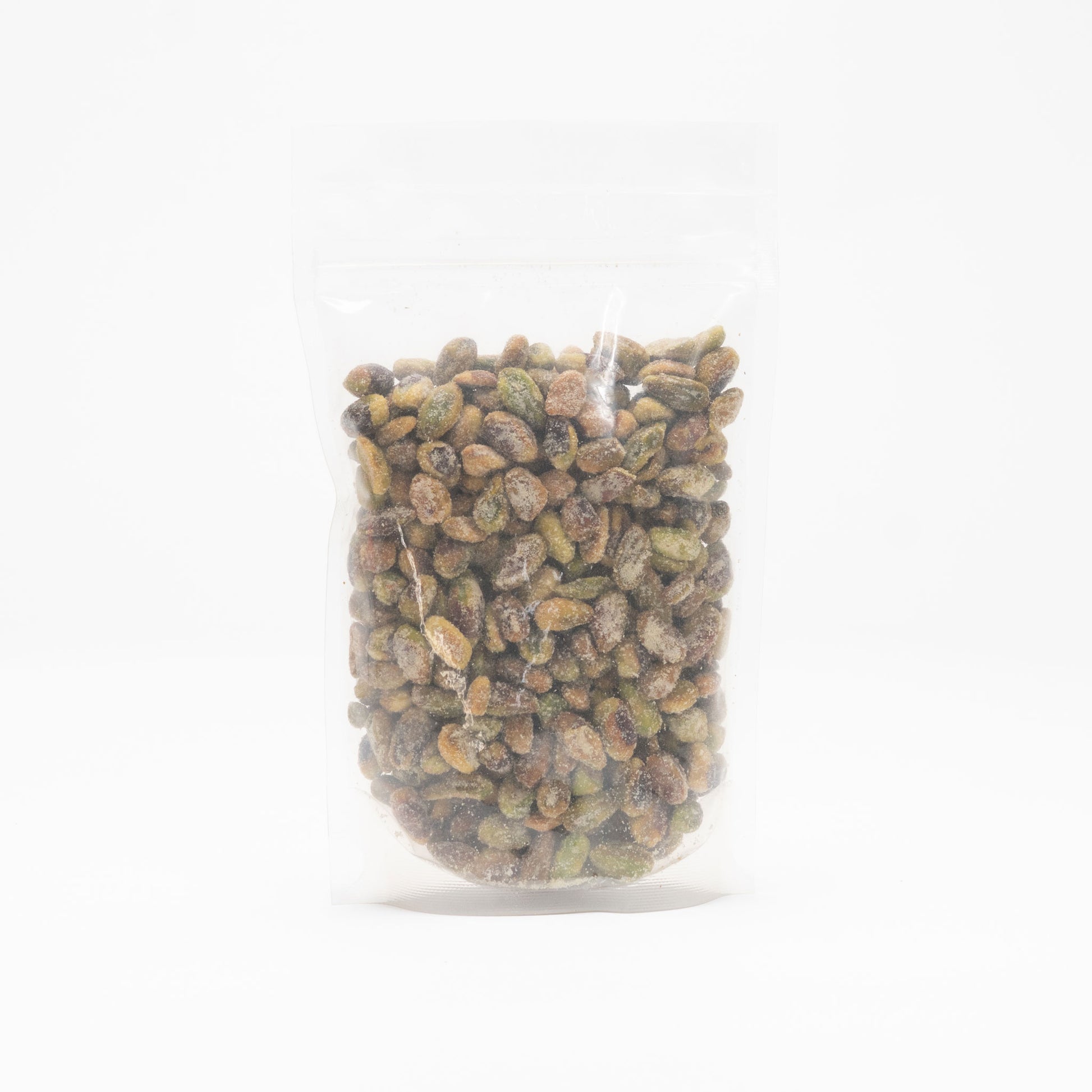 Back view of a clear bag of unshelled honey roasted pistachios