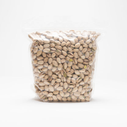 Back view of a clear bag of raw pistachios