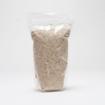 Back view of a clear bag of raw almond flour