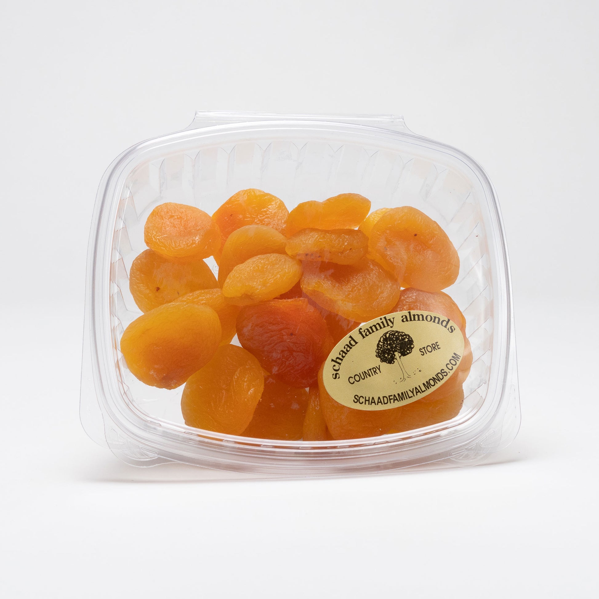 Clear container of dried apricots