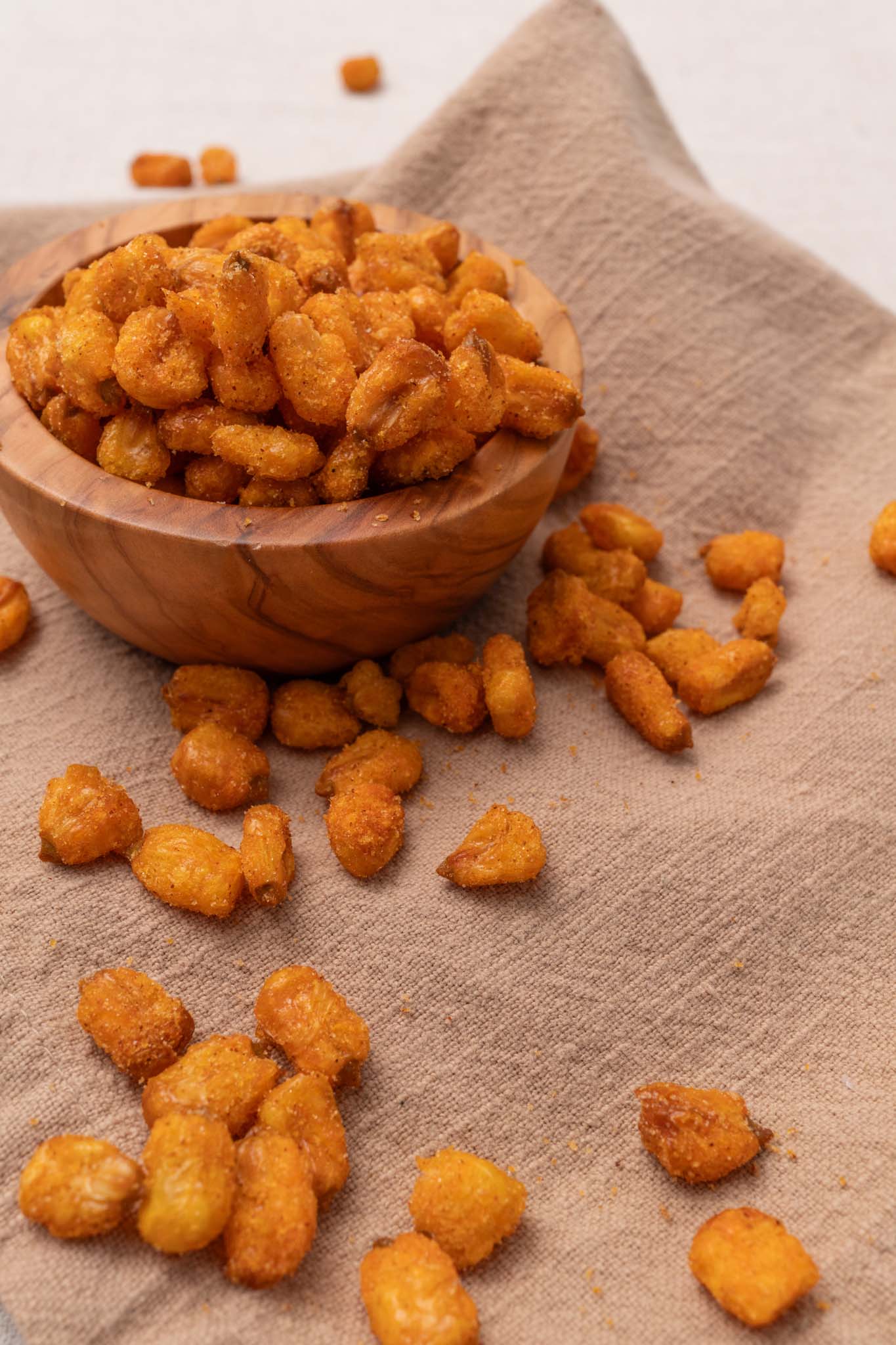 Wooden bowl filled with BBQ corn nuggets